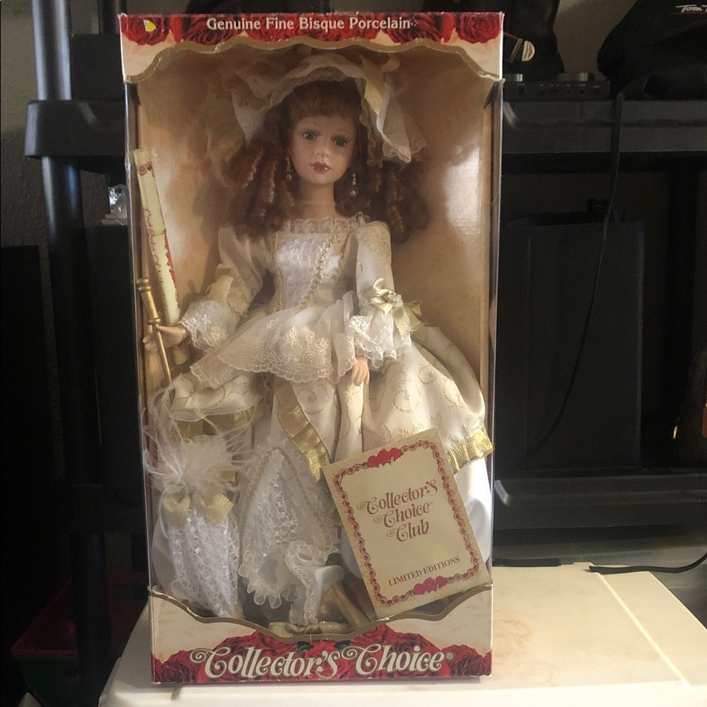 Porcelain Doll in Elegant White and Gold